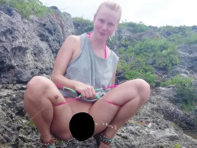 Meine nasse Muschi spritzen lässt, während ich über den Klippen pisse